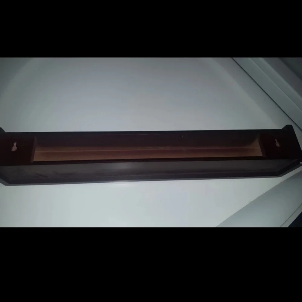 Small dark cherry color wall shelf